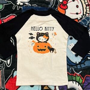 Hello kitty Halloween pumpkin 3/4 sleeveve! Size sml. Brand new! Never worn!